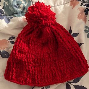 Red vibrant hand made hat that comes in more colors